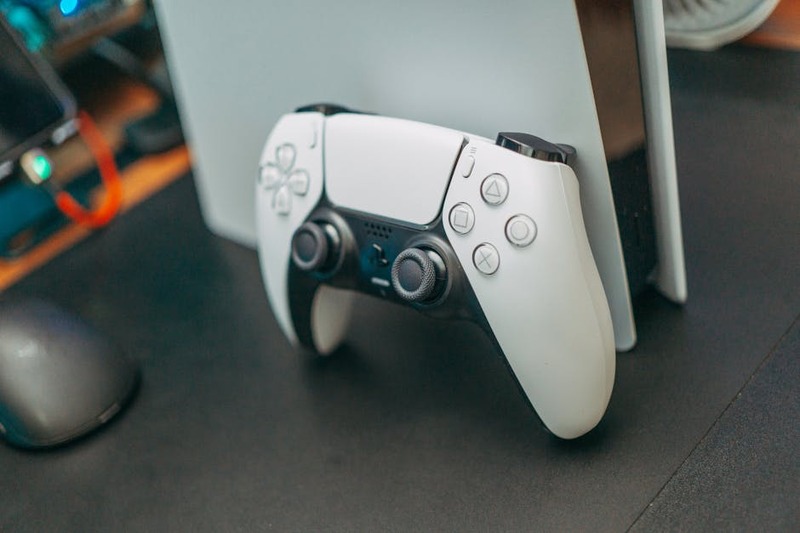 PS5 user interface dashboard with game icons