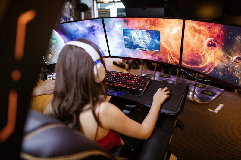 Person intensely focused on a game with smooth graphics